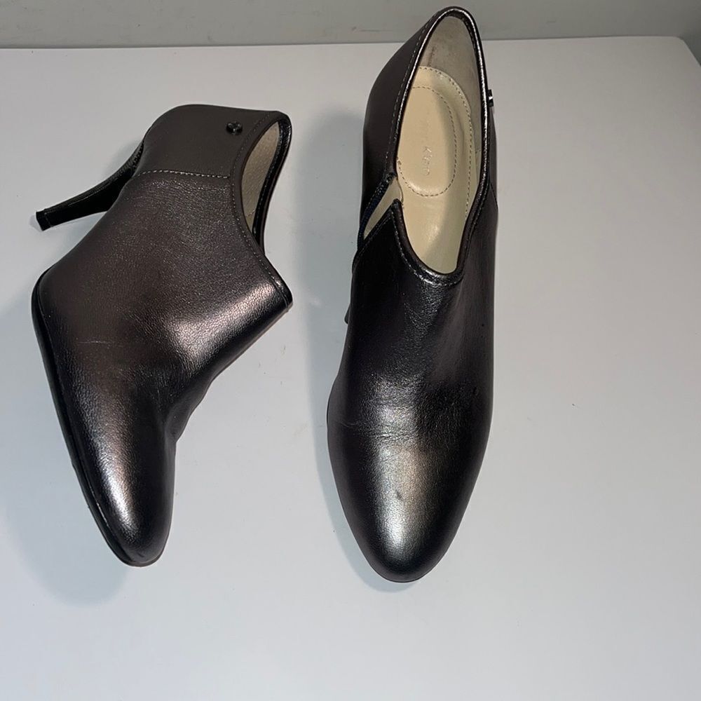 Calvin Klein grey pewter leather 3.5” heel bootie w/ side zipper.